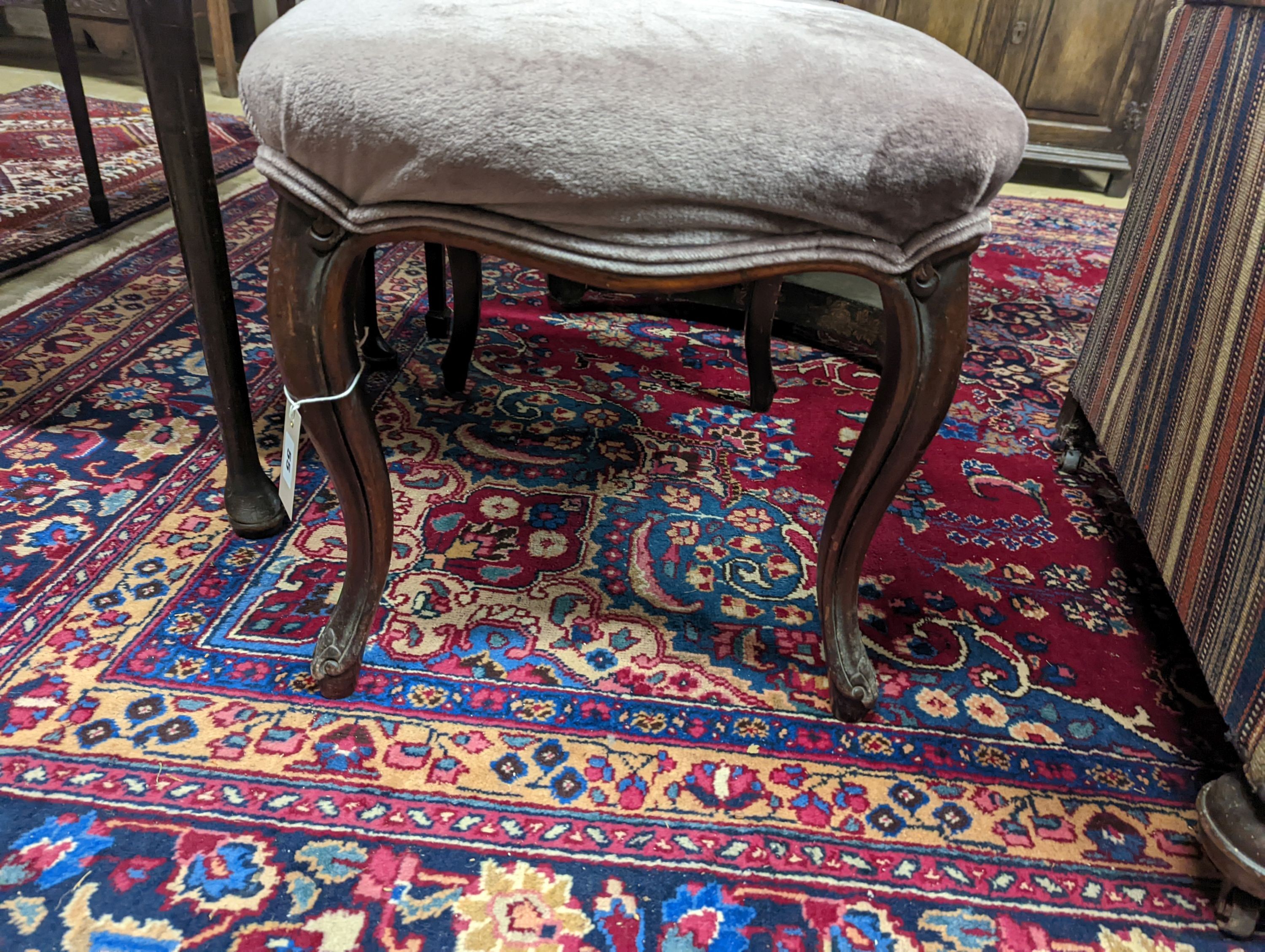 A Victorian mahogany upholstered footstool. H-47cm